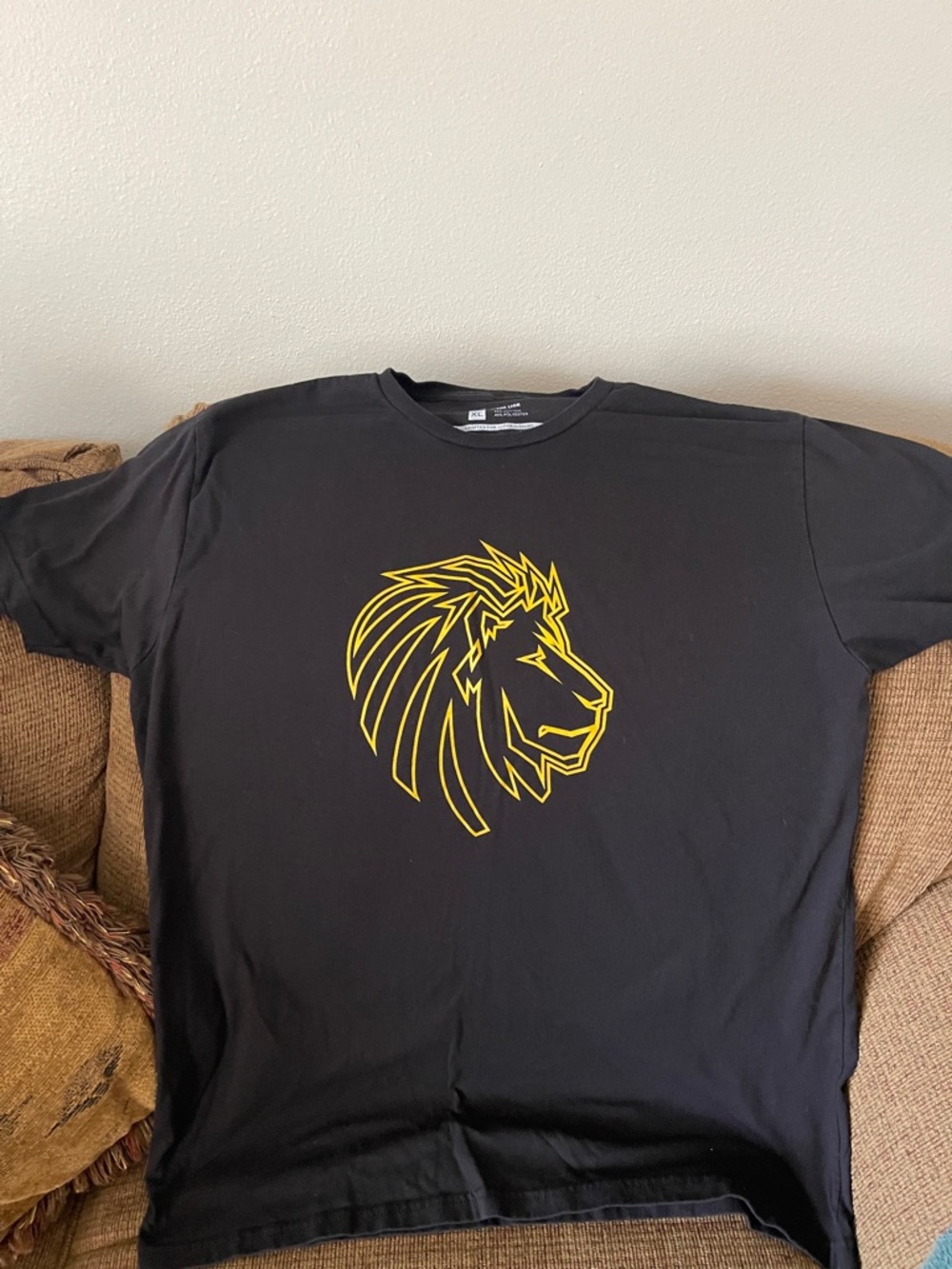 Black Men's Short Sleeve Tee with Yellow Lion Graphic